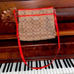 Crossbody tan and orange trim coach bag!